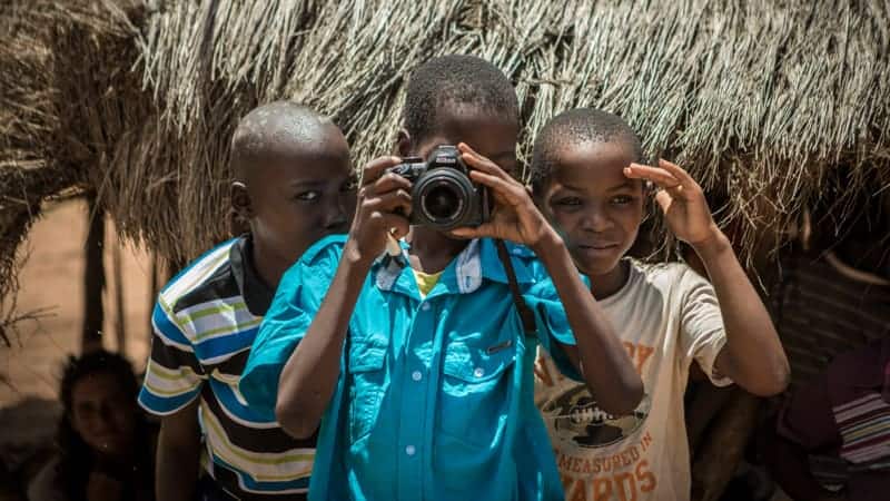 African boys with camera