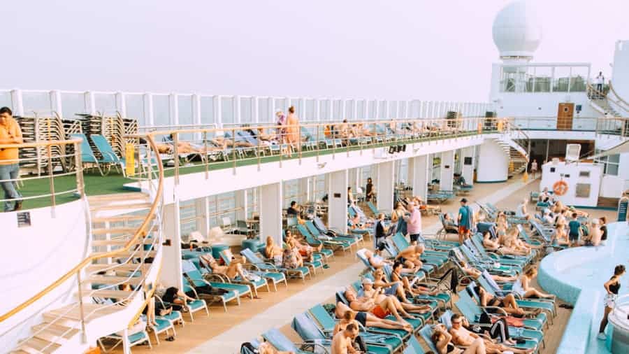 Swimming pool and lounges on cruise ship