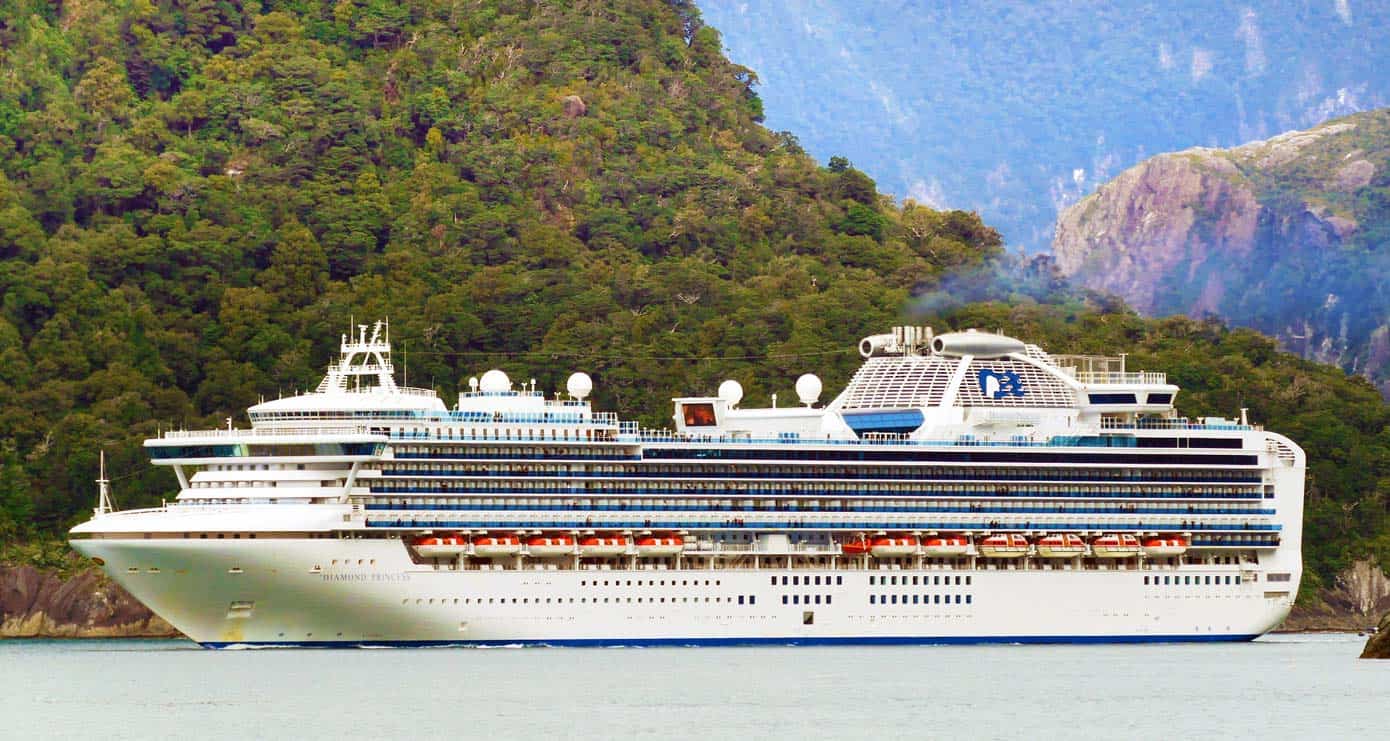 Cruise ship sailing through the Milford Sound, New Zealand.