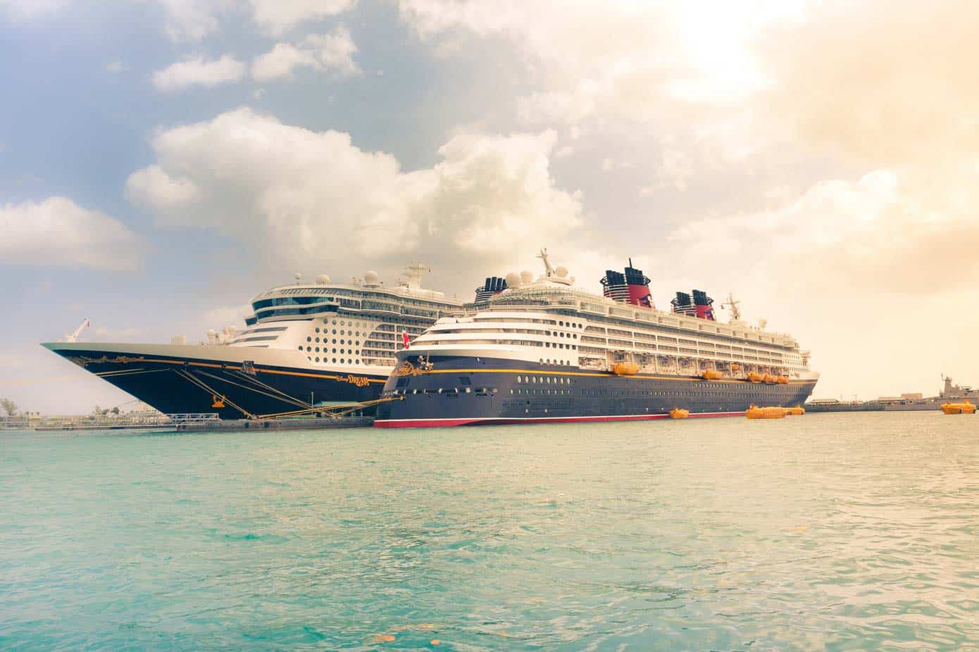 Two cruise ships in docked.