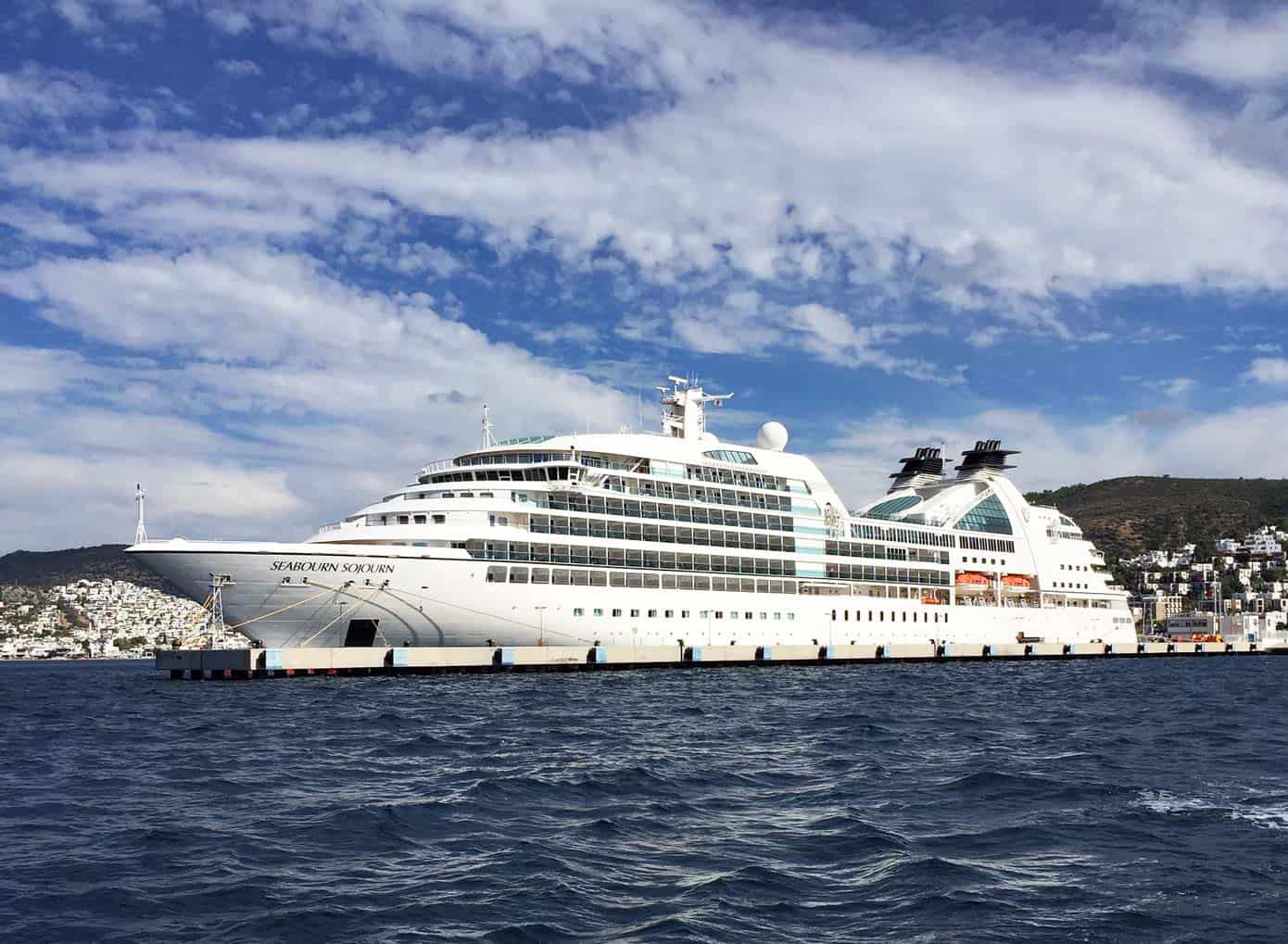 Cruise ship sitting at dock.