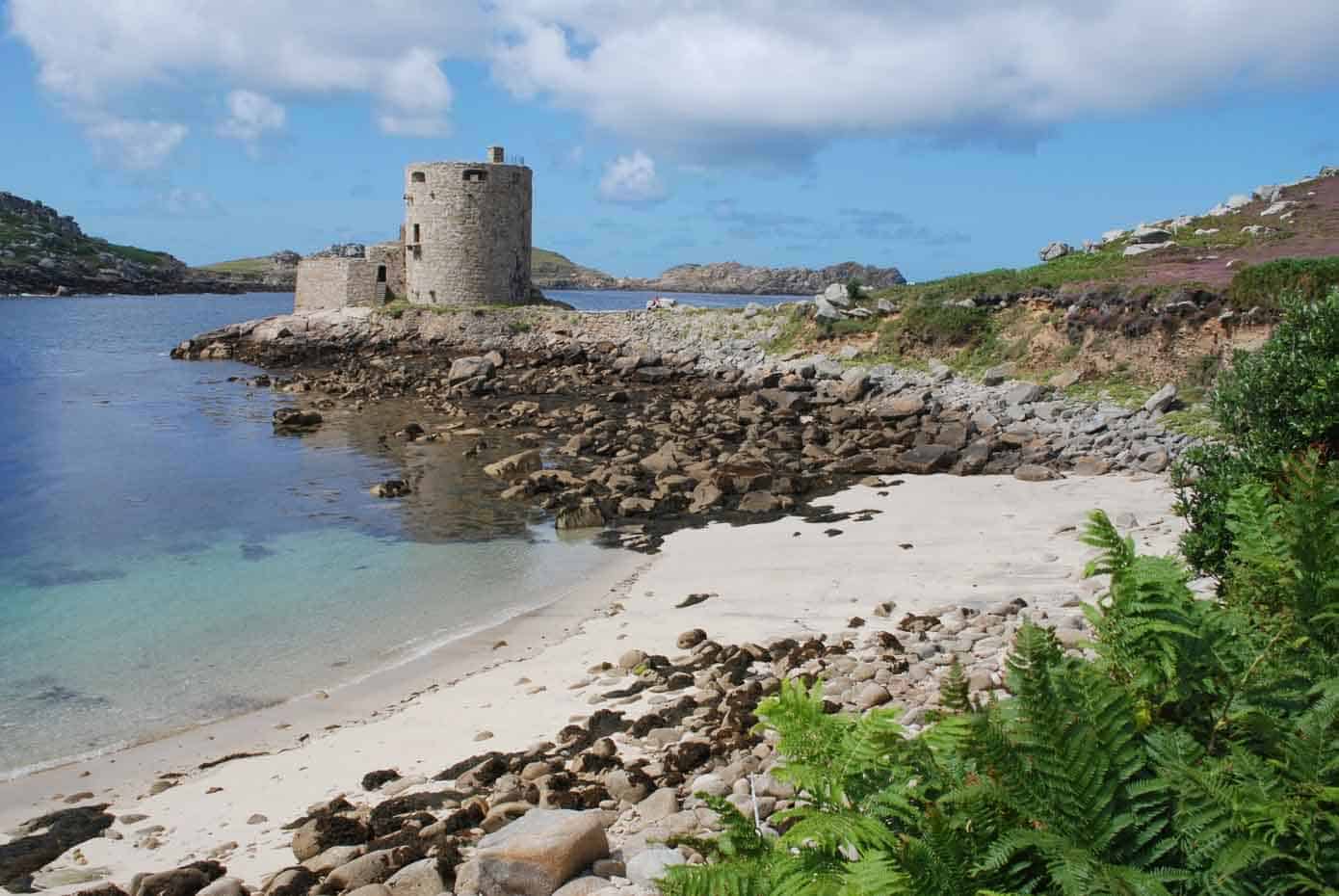 Small castle on a rocky beach.