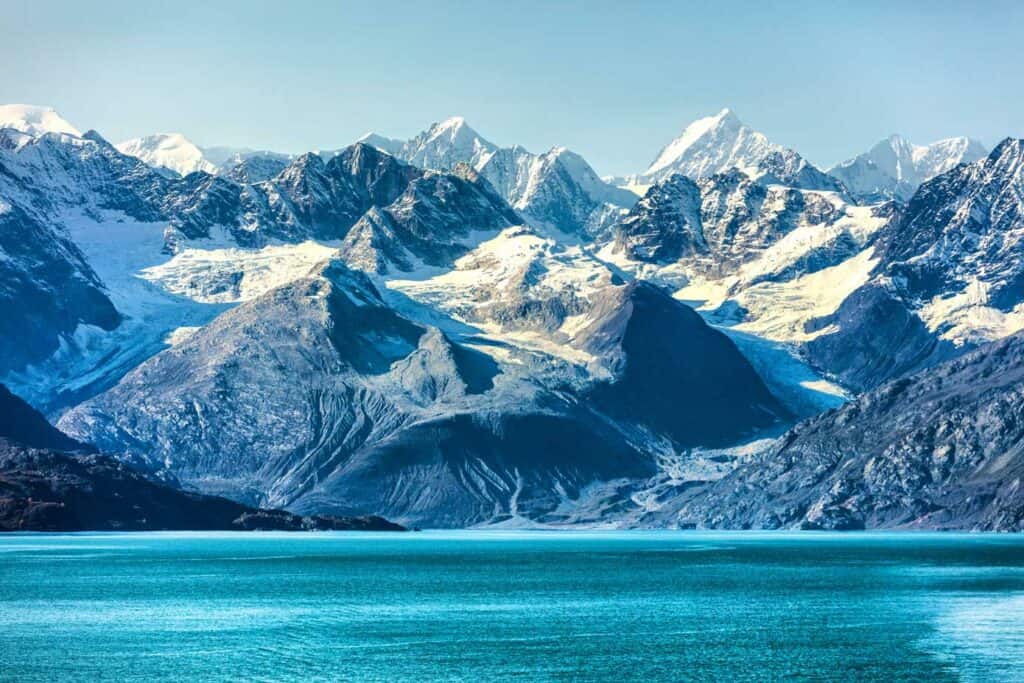 Mountains overlooking picturesque Glacier Bay National Park on an Alaska cruise.