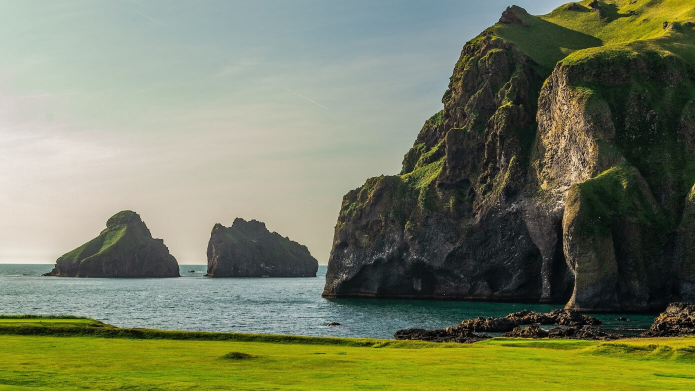 Explore Iceland on a Yacht with Windstar Cruises Elephant Rock, Heimaey, Iceland.