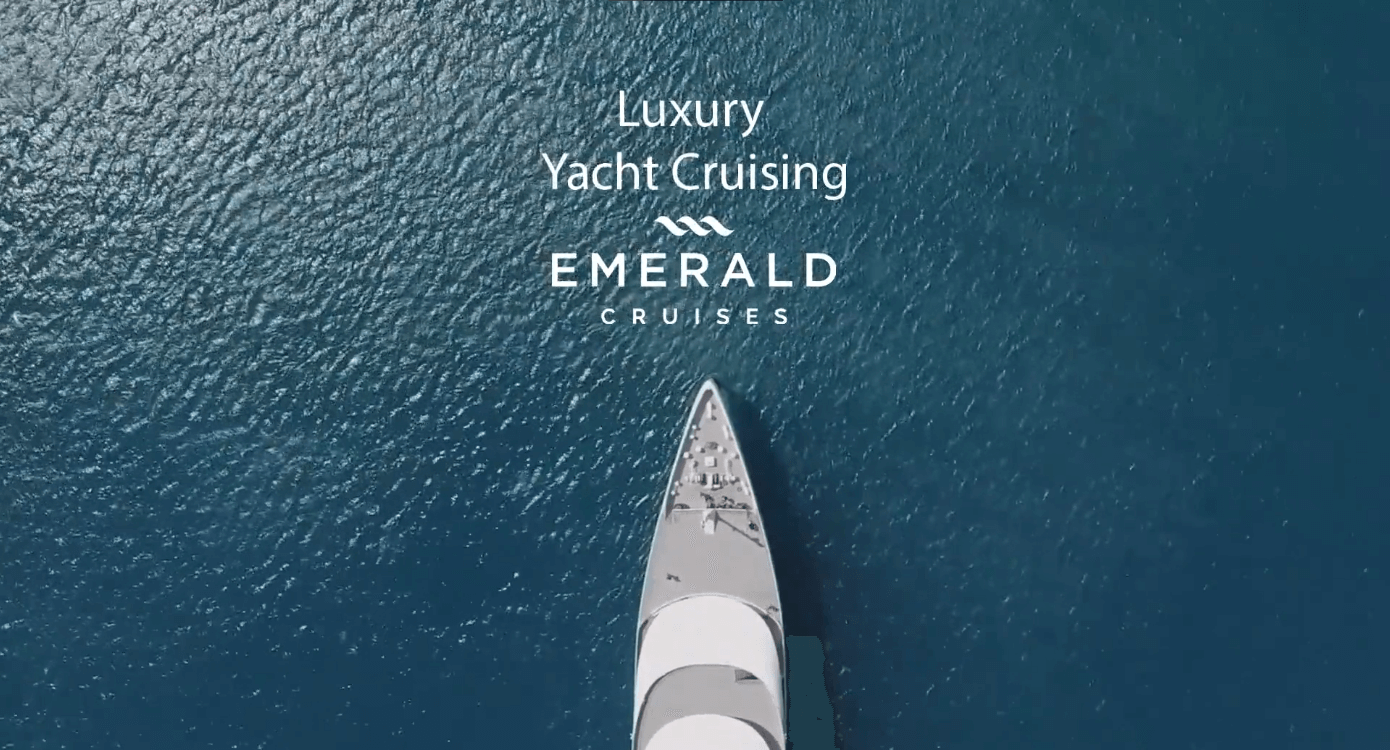 Emerald yacht cruising in the ocean.