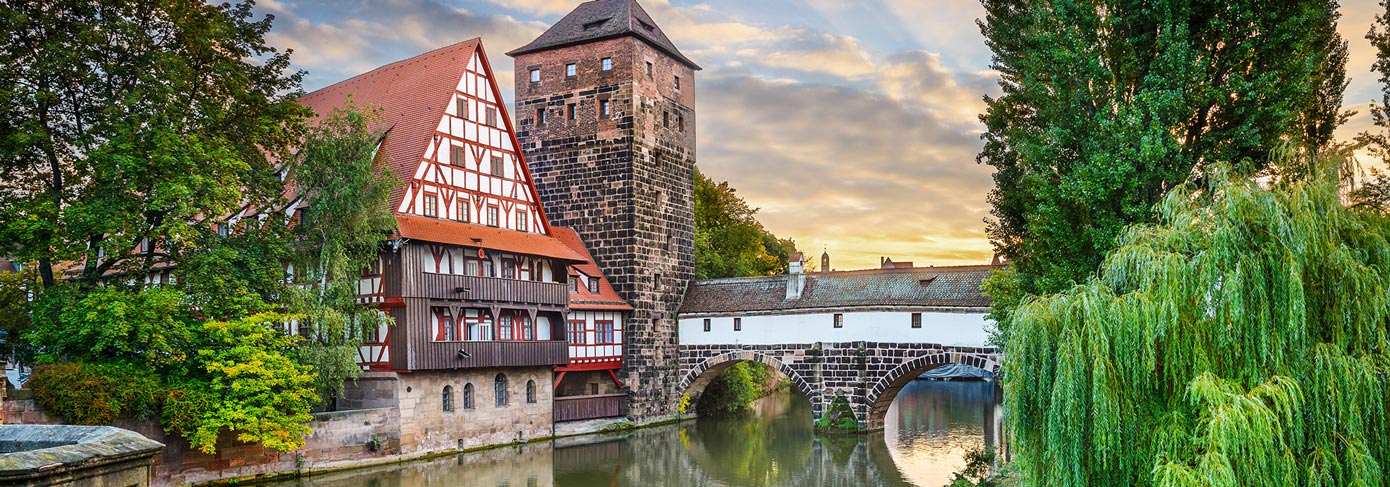 House and bridge on river in Nuremberg, Germany.